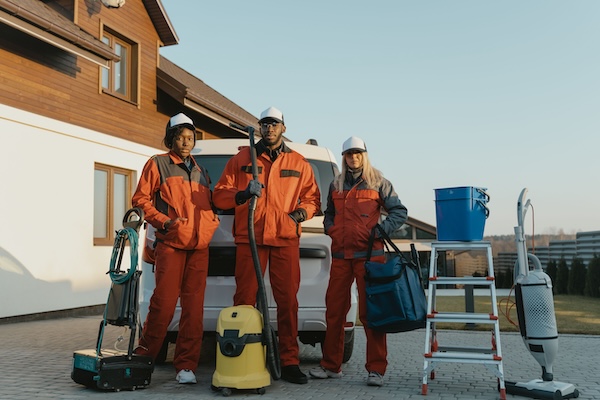 Maintenance team in front of their van